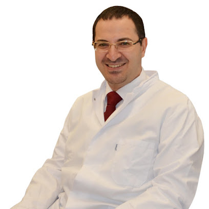 د.محمد عباس ازمرلي Dr.Mohammad Ezmerli البورد الالماني في طب الامراض الجلدية والامريكي في التجميل
