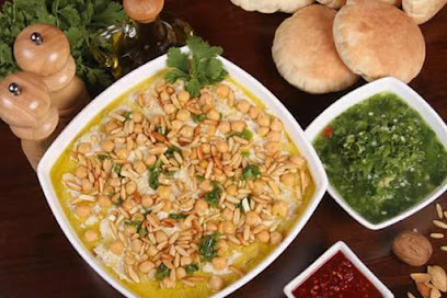 مطعم عادل حمادة