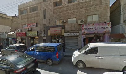 طبيب أسنان - د. إياد ولويل
