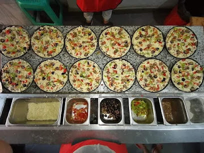 بيتزا و فطائرالزعيم