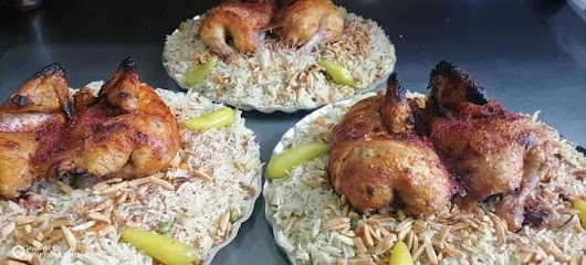 مطعم زهرة تبوك للرز البخاري والمشويات