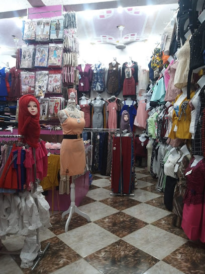 محل فساتين سهرات مديلات راقيه نسائي بناتي محلي بلجمله باب السلام شارع سكره امام الاكوع للاكترونيات جوار الانسي للقات