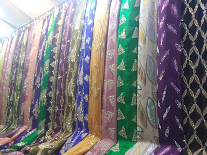 محلات توفيق الكبودي للملابس