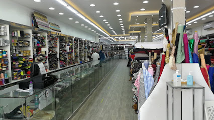 الساكت لبيع لوازم الخياطة والاقمشة