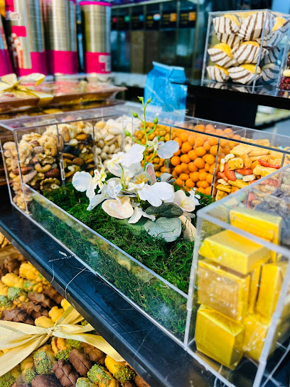 Hawl Al Dhaid Sweets & Flowers. محمصة حول الذيد