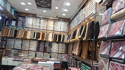 محل الصفوة للمشالح الملكية والشماغات والعود