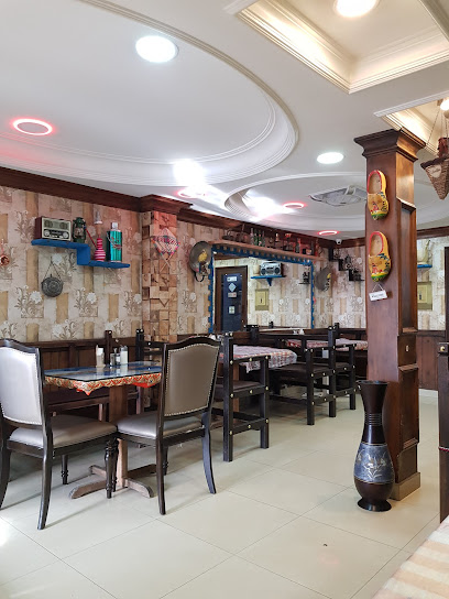 مطعم النفق الشعبي قرية بوري