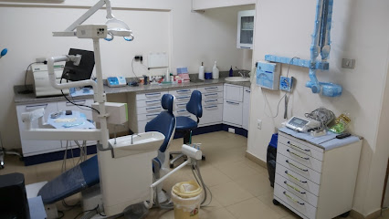 bloom dental clinic عيادة د/مينا فؤاد سعد