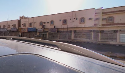 محل القمة للملابس الجاهزة