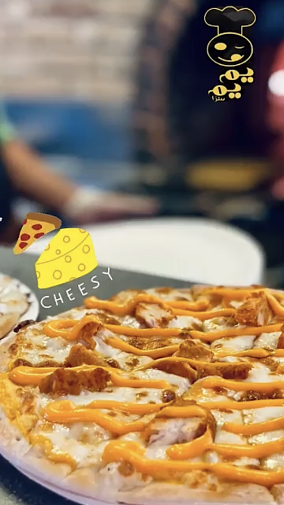 يم يم بيتزا (فرع الرس)