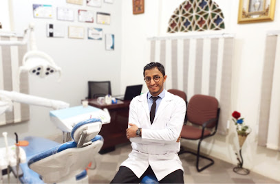 عيادة د. طارق الحوثي لتجميل و تقويم الأسنان _ مركز عالم الطب