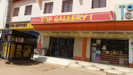 توب غاليري