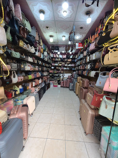 محل الملكة للشنط