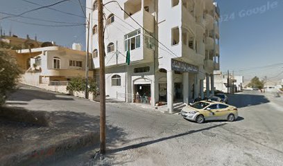 محل سعف النخيل لمواد البناء