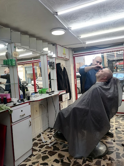 محل احمد خميس عاشور للحلاقة