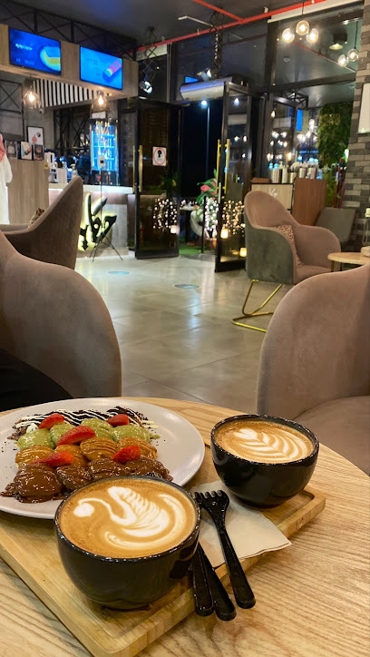 حكاية - مقهى مختص ومحمصة